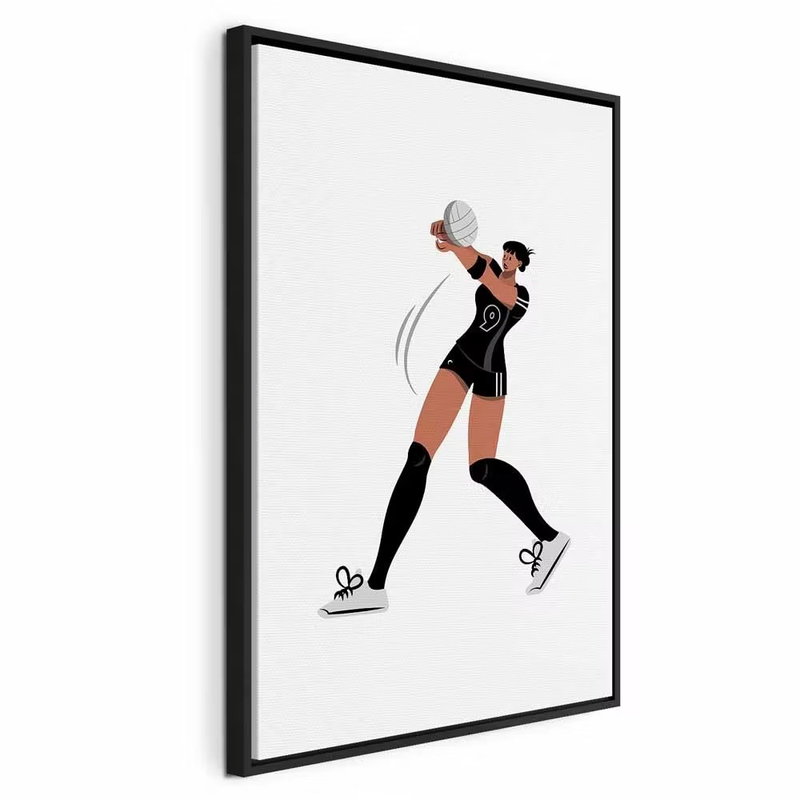 Female volleyball player – svart ram. En kvinna i svart idrottsdräkt sträcker armarna mot en rund boll mot en vit, avskalad bakgrund.