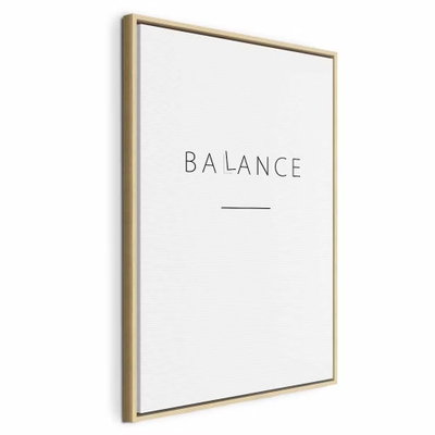 Balance of words black – naturfärgad ram. Ordet BALANCE står med tunna grå bokstäver ovan ett kort streck på en stor vit yta.