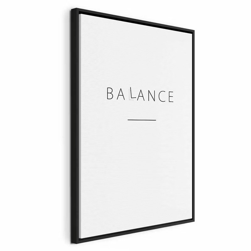 Balance of words black – svart ram. Ordet BALANCE står med tunna grå bokstäver ovan ett kort streck på en stor vit yta.