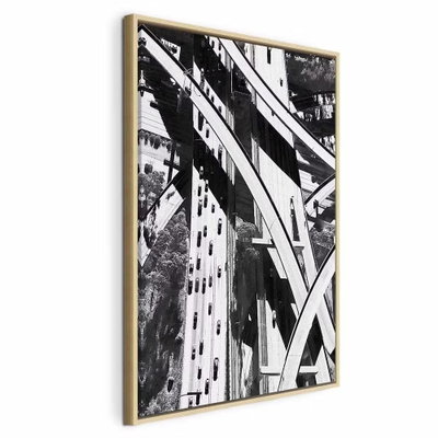 City geometry vertical – naturfärgad ram. Nitar, raka balkar och kraftiga diagonaler fyller en svartvit närbild av en stålkonstruktion.
