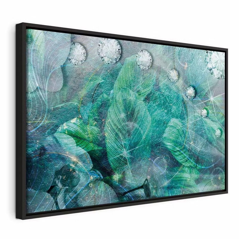 Turquoise leaves wide – svart ram. Täta gröna och turkosa blad täcks av runda vattendroppar mot en mjukt suddig bakgrund.
