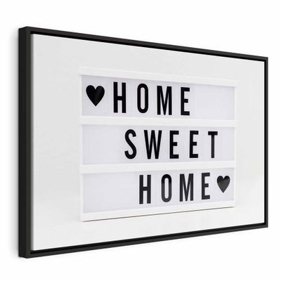 Cinema light box vertical – svart ram. En vit ljusskyltsliknande bild med svarta bokstäver och små hjärtan visar orden HOME SWEET HOME.