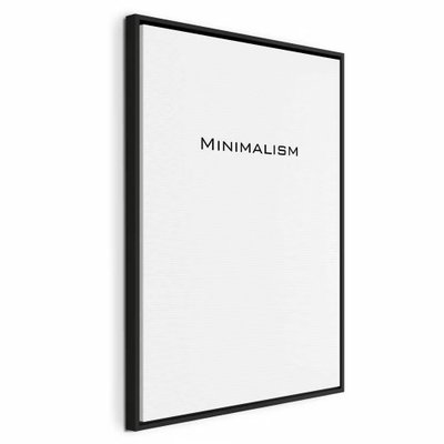 Minimalism vertical – svart ram. Ordet MINIMALISM står med små mörka bokstäver på en stor, vit bildyta.