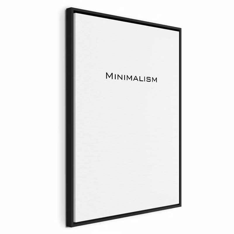 Minimalism vertical – svart ram. Ordet MINIMALISM står med små mörka bokstäver på en stor, vit bildyta.