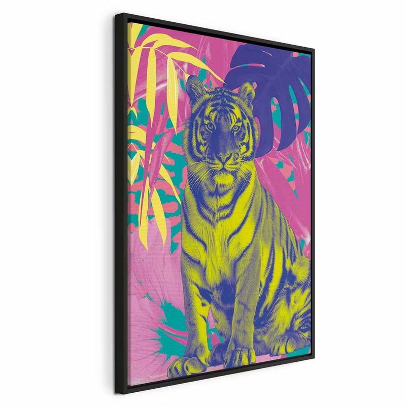 Colorful tiger intense – svart ram. En gul och blå tiger med tydliga ränder sitter bland starkt rosa, gröna och lila tropiska blad.