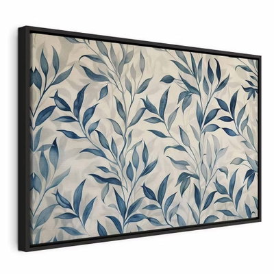 Leaves in blue color – svart ram. Små och stora blå blad sprider sig i tunna grenar över en ljust crèmefärgad bakgrund.