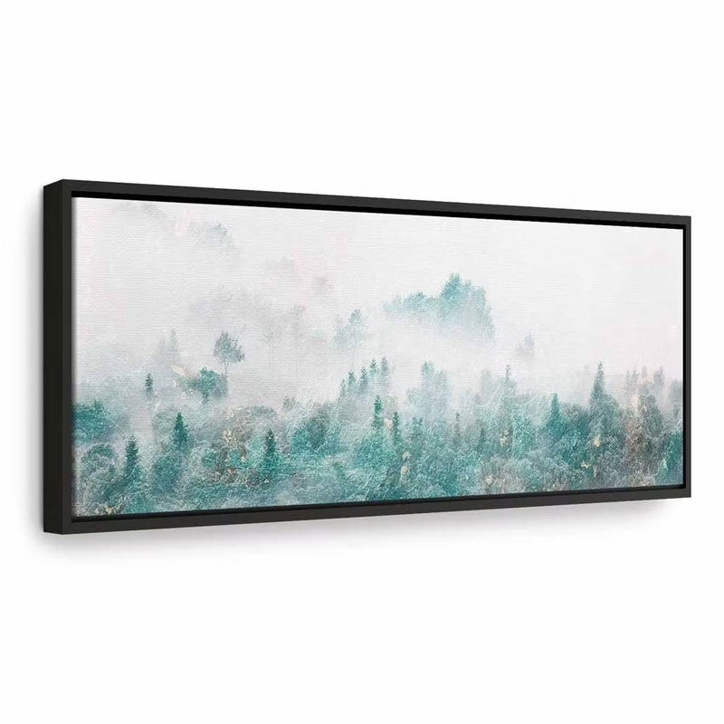 Turquoise valley narrow – svart ram. Dimmiga trädtoppar i blågrönt möter ljusa berg i en långsträckt landskapsvy.