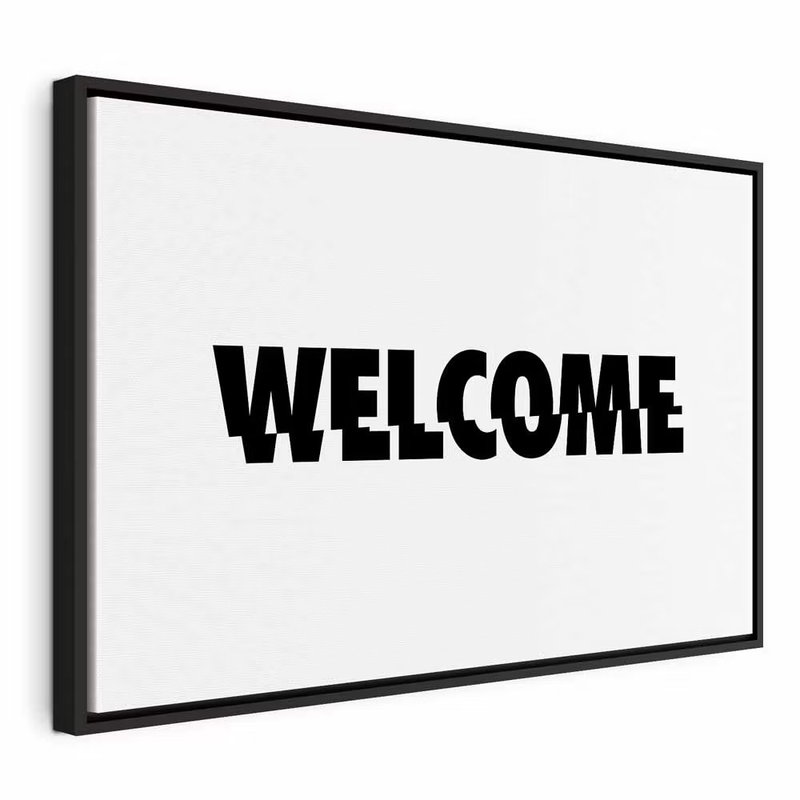 Welcome wide – svart ram. Ordet WELCOME återges med stora svarta bokstäver mot en vit botten.