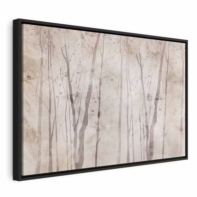 Beige forest of thoughts – svart ram. Smala, bleka trädstammar och skissartade kvistar ligger över varandra i ett ljust beige skogsmotiv.