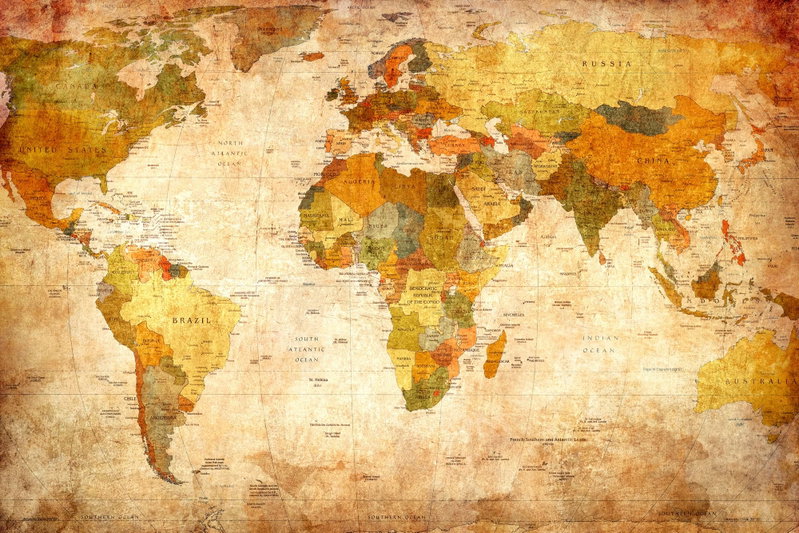 World map time travel: Gula, orange och rostbruna kontinenter möter en ljus, åldrad bakgrund med små kartdetaljer.