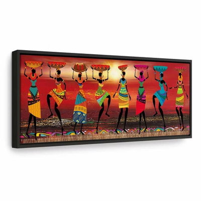 African women dancing – svart ram. En rad stiliserade kvinnor i färgstarka kläder bär korgar och sträcker armarna uppåt mot en orange bakgrund.