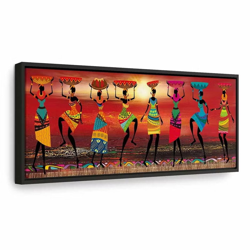 African women dancing – svart ram. En rad stiliserade kvinnor i färgstarka kläder bär korgar och sträcker armarna uppåt mot en orange bakgrund.