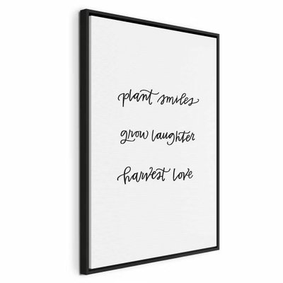 Joy and love vertical – svart ram. Orden plant smiles grow laughter harvest love står i tre luftiga rader med svart handskriftsliknande stil på vitt.