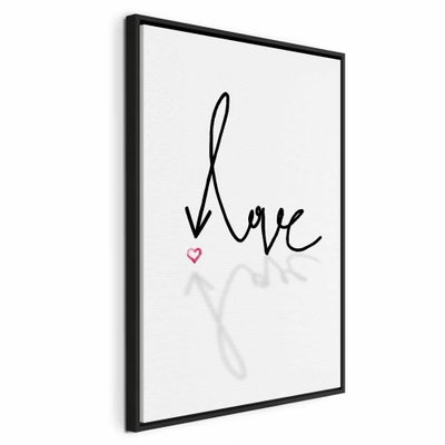 This is love vertical – svart ram. Handskriftsliknande svart typografi och ett rosa hjärta bildar ett enkelt textmotiv på vit botten.