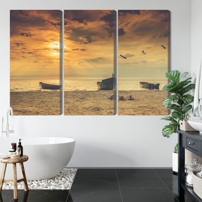 Ljuddämpande tavla - Boats on the beach at sunset