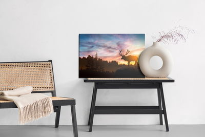 Ljuddämpande tavla - Deer at sunset