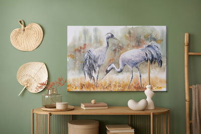 Ljuddämpande tavla - Cranes on field