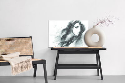 Ljuddämpande tavla - A female portrait in black