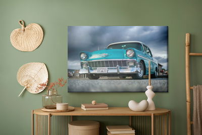 Ljuddämpande tavla - Turquoise car and clouds