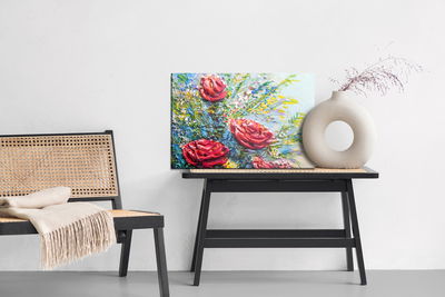 Ljuddämpande tavla - A painting of blooming roses