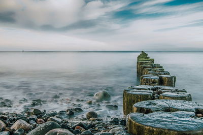 Ljuddämpande tavla - Rocky beach and 3d wooden