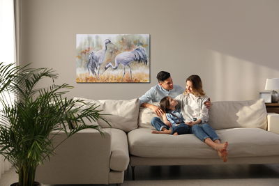 Ljuddämpande tavla - Cranes on field