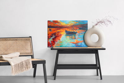 Ljuddämpande tavla - Painted boats in the sea