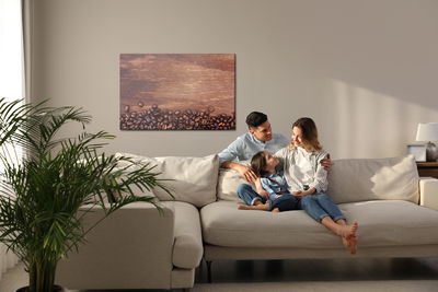 Ljuddämpande tavla - Coffee beans on a wood