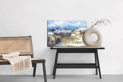 Ljuddämpande tavla - Old huts in the mountains