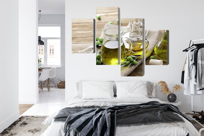 Ljuddämpande tavla - Olive oil with green olives