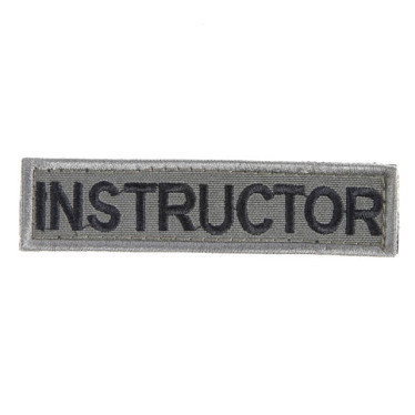 Litet instructor märke -12