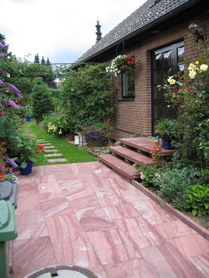 Flammade plattor av Älvdalskvartsit lämpliga för uteplats