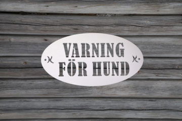 Fasadskylt - Varning för hund