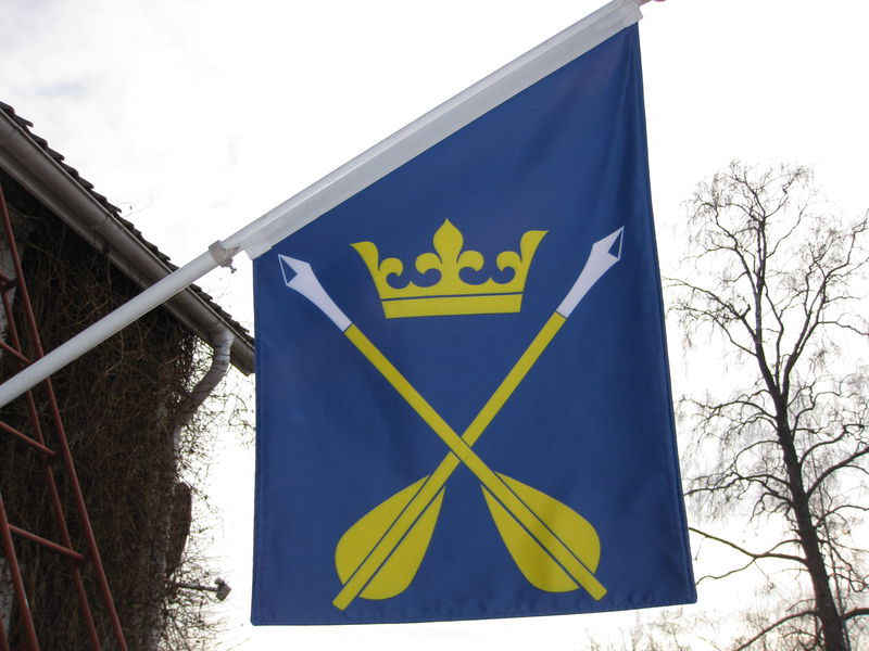 Fasadflagga - Dalarnas landskapsvapen Dalpilarna