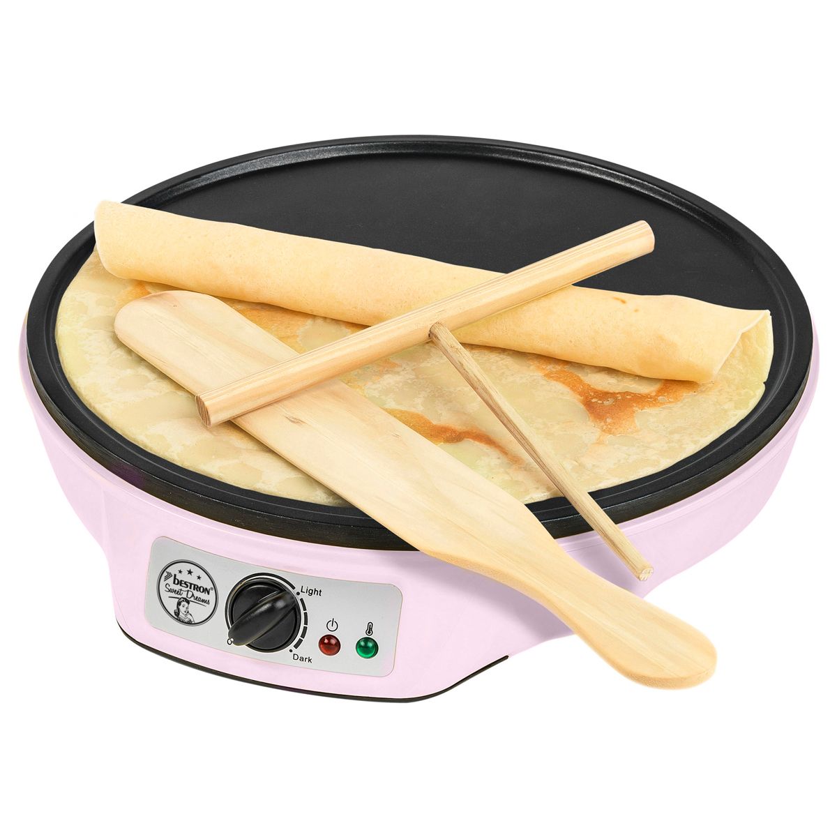 Crêpemaker med crêpe på gräddytan och slev ovanför