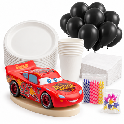 Cars Bas – tårtfigur med ljus, vit dukning och svarta ballonger