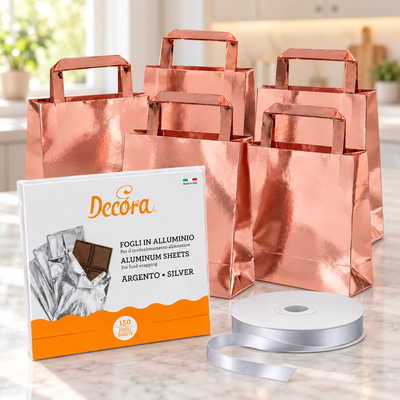 Miljöbild: Chokladgåvor i fem påsar – folie och rosett