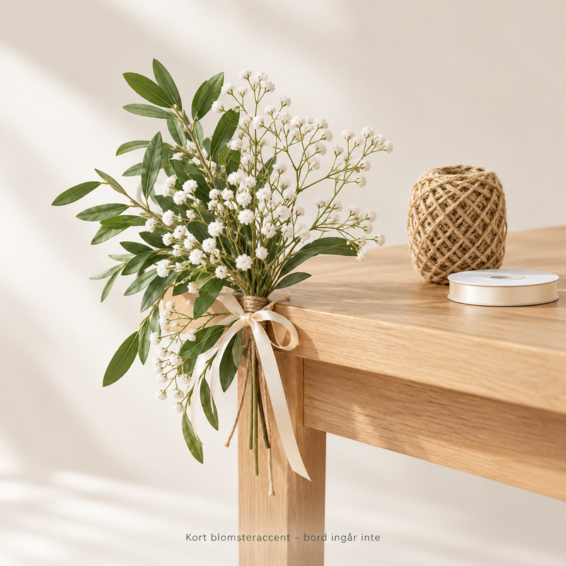 Blomsteraccent längs presentbordets kant