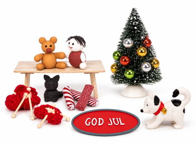 Julklappsateljén med DIY-pyssel, julgran, God Jul-skylt och hund