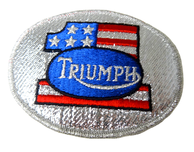 Tygmärke Triumph 1:an Ovalt 7,5×10 cm – Äkta 70-tal, USA
